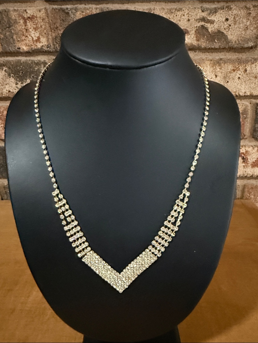 Rhinestone gold tone V necklace